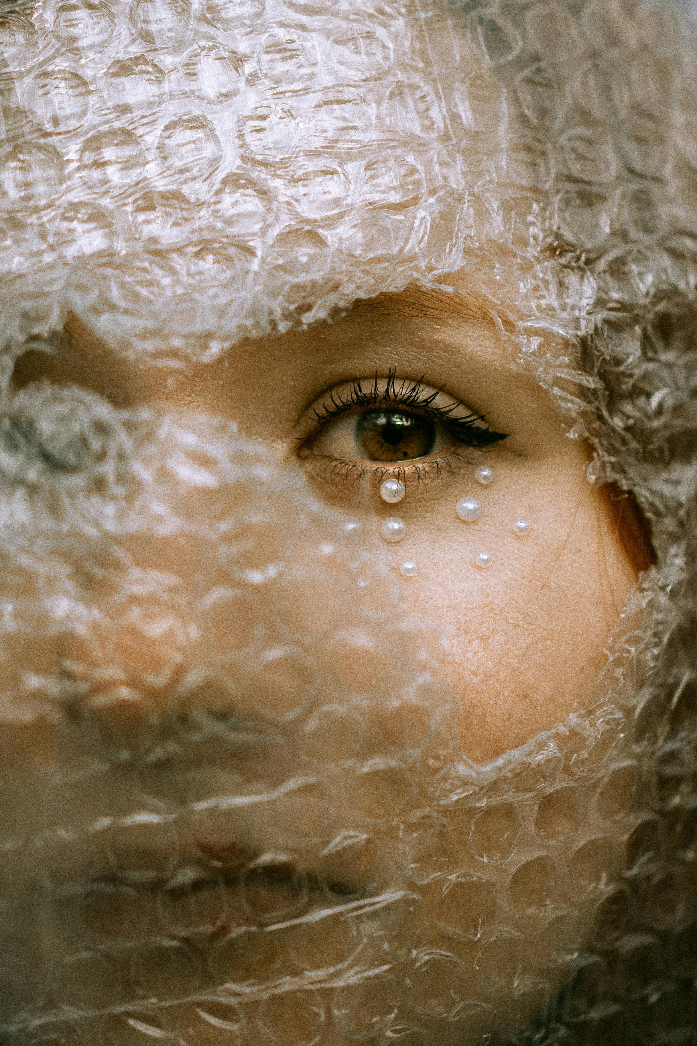 a woman with a bubble wrapped face