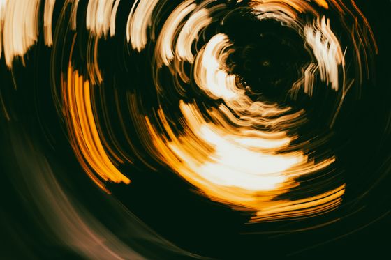 Circular light trails in motion, photo by terence b on Pexels