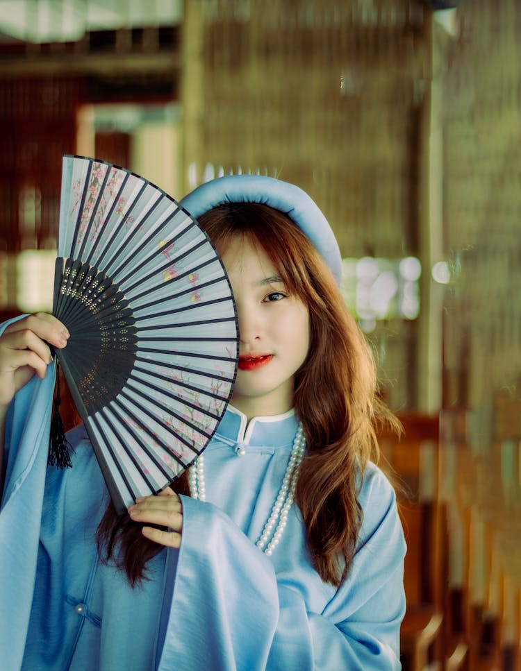 Young Woman In Ao Dai - Traditional Vietnamese Clothing 