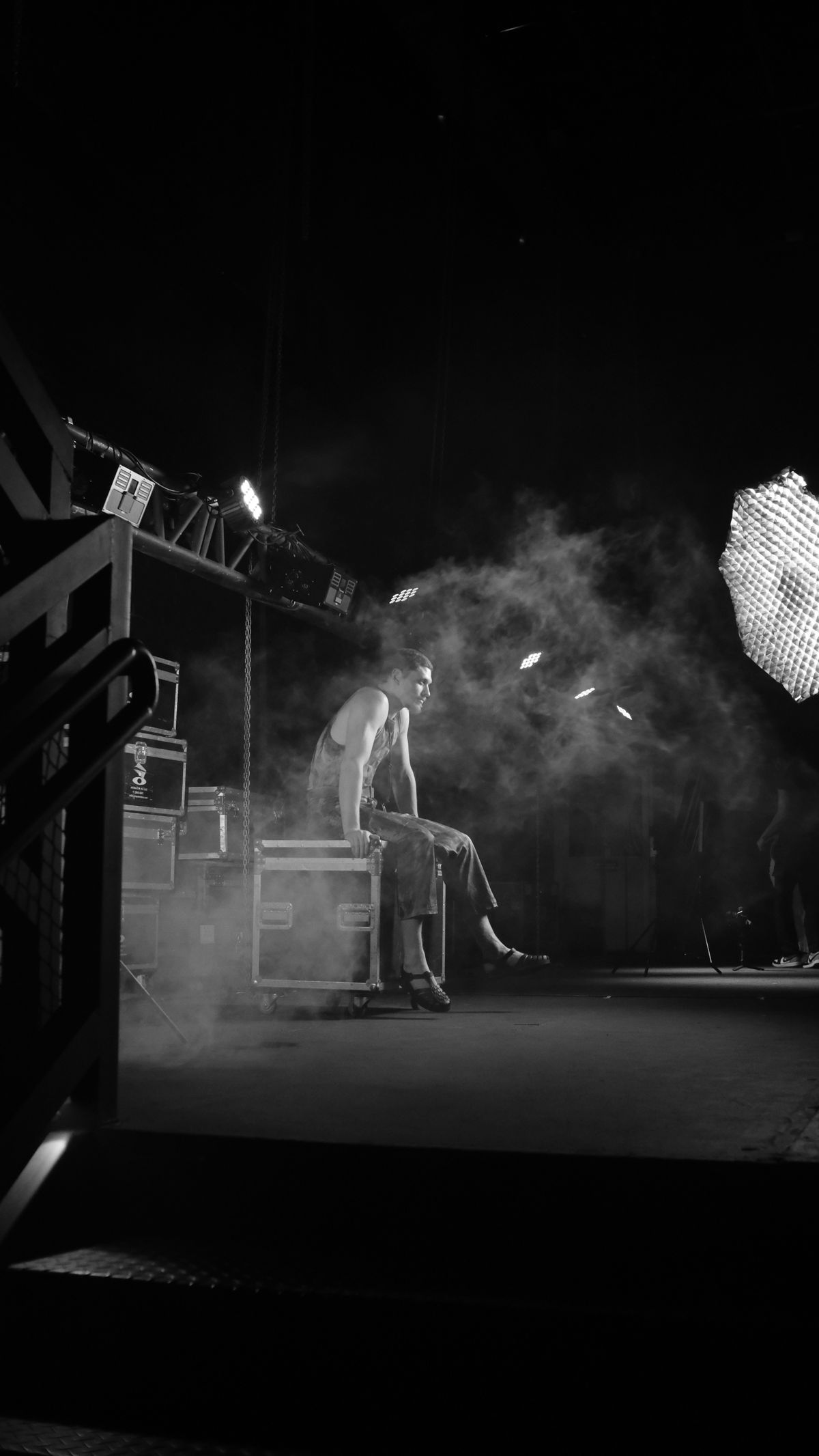 Lighting equipment backstage, lit through haze