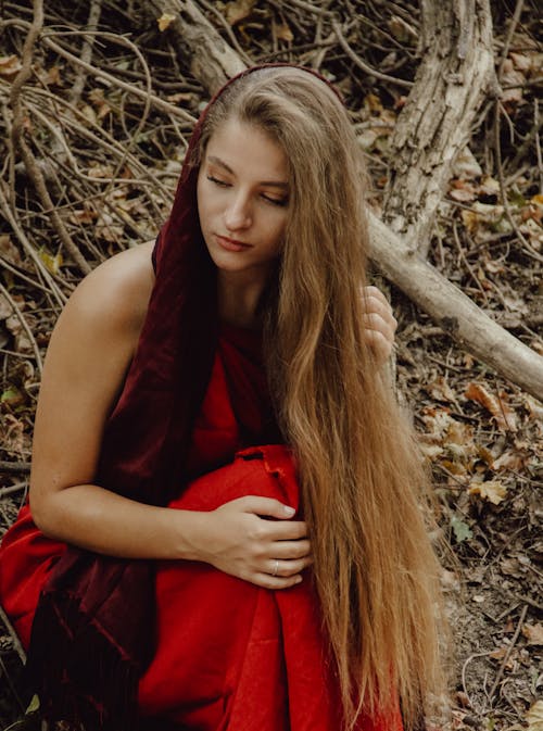 Model in Red Dress in Forest