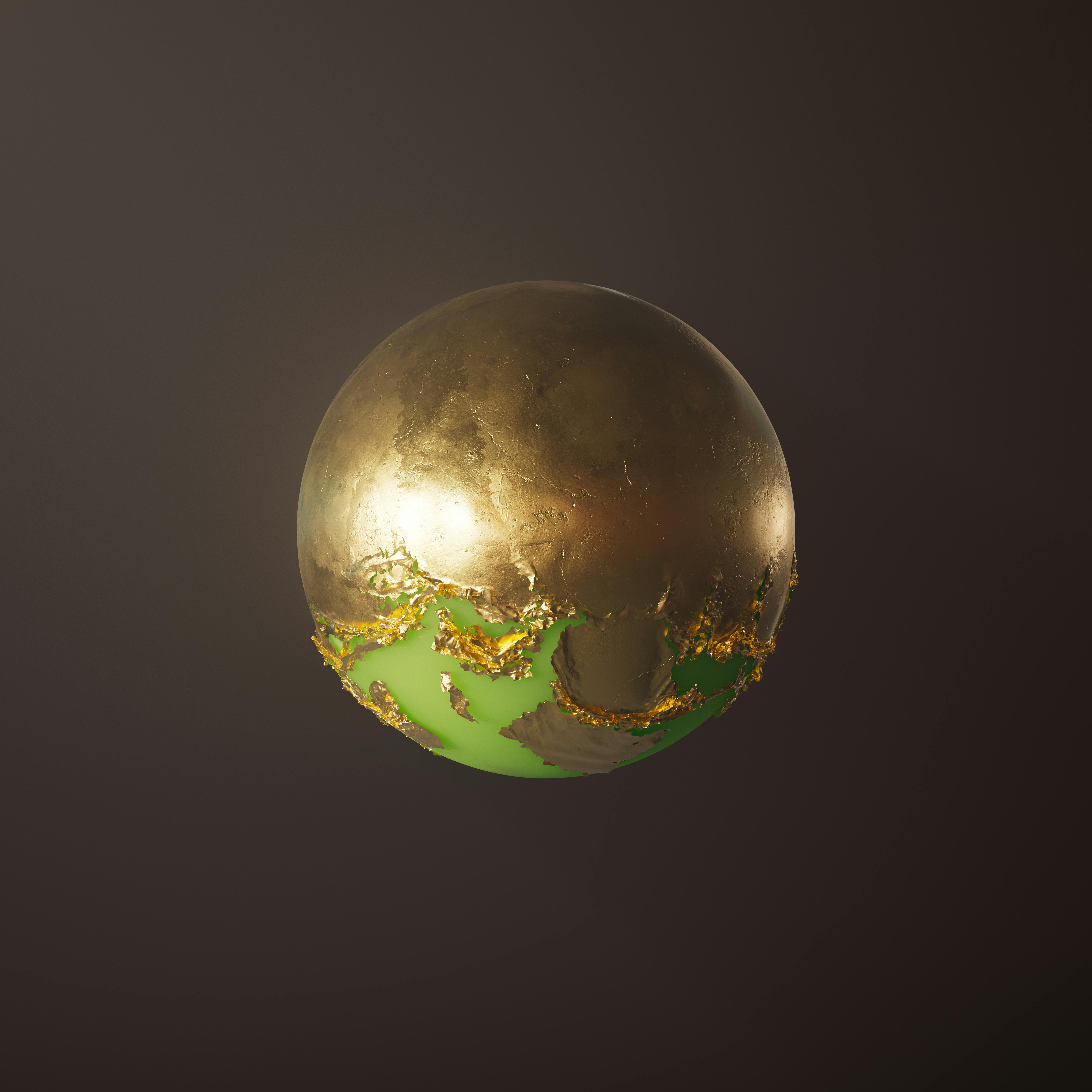 A golden sphere with abstract green elements on a dark background, creating a luxurious look.
