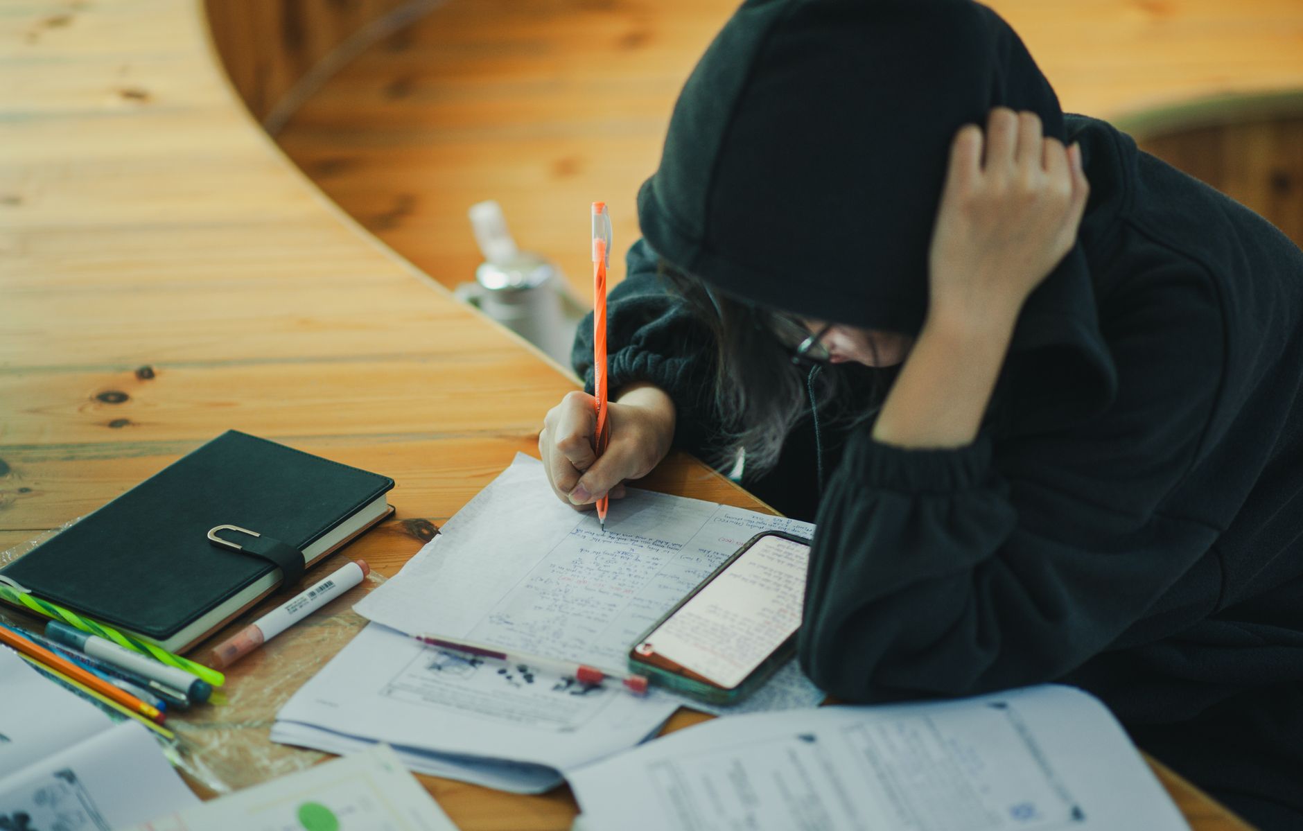 Indian college student using AI tools on laptop for exam preparation