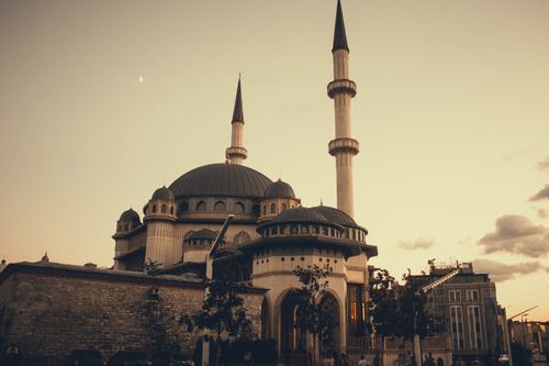 Free Sunset over the Taksim Mosque in Istanbul with a warm, inviting glow. Stock Photo