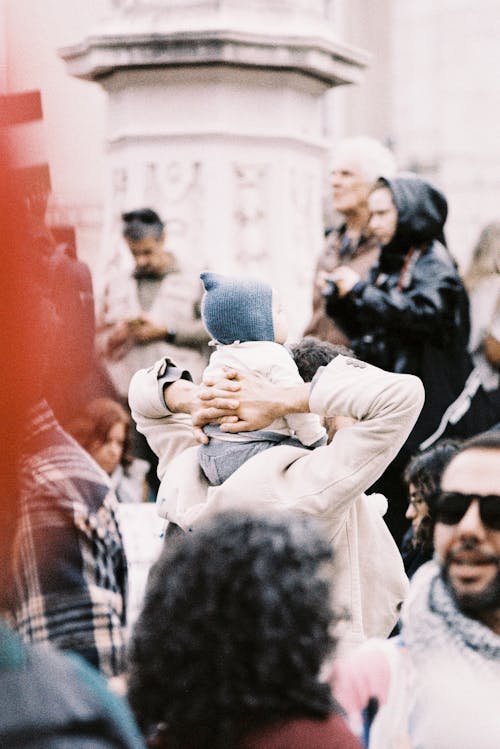 Parent with Baby at Demonstration