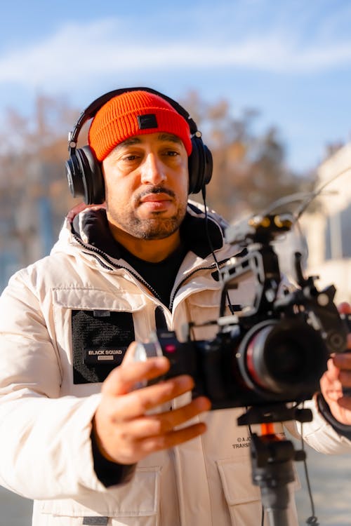 Foto profissional grátis de aparelhos, câmera, cameraman