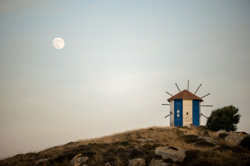 Full Moon Over a Hilltop