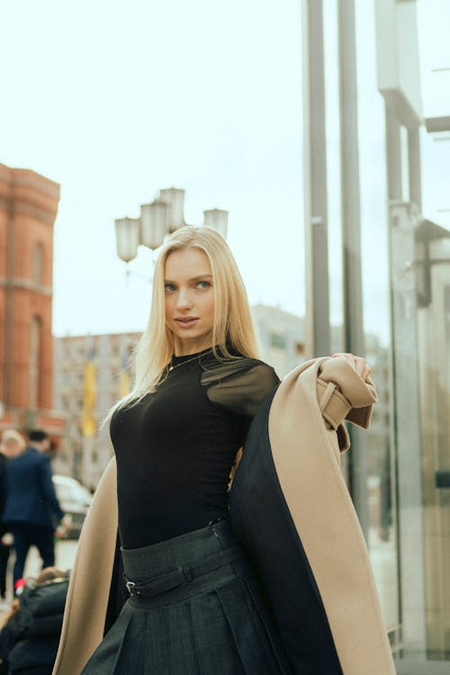 Fashionable Woman Posing on a Street in City 