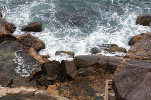 Waves Crashing against Rocky Shore