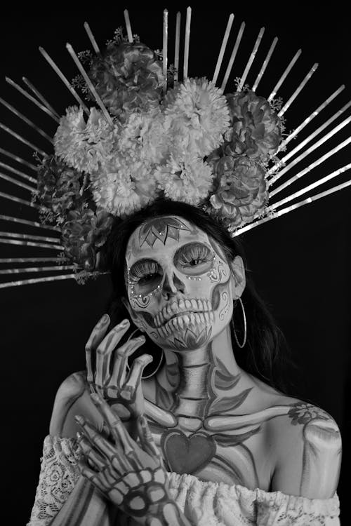 Woman in Makeup and Costume of Catrina