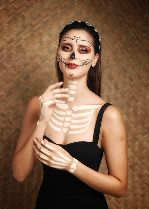 Woman in Artistic Makeup for Dia de Muertos
