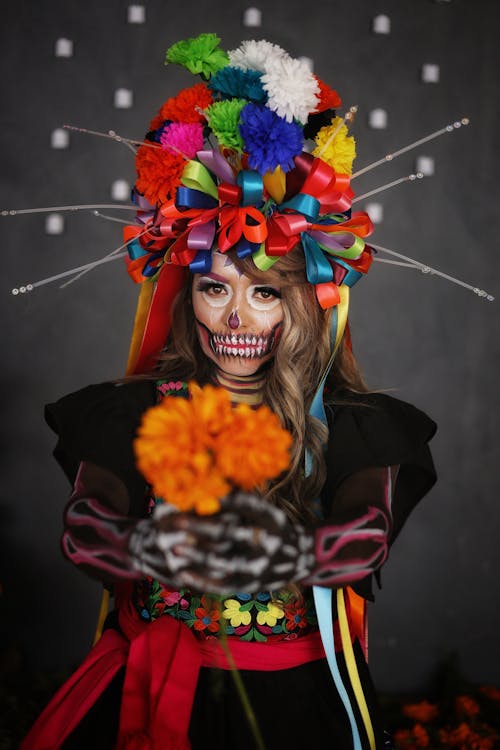 Beautiful Dancer with Flowers Dressed for Dia de Muertos