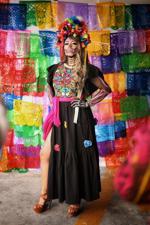 Woman in Makeup and Dress for Dia de Muertos