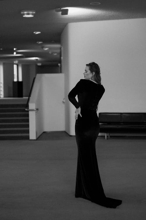 Back View of Woman in Dress in Black and White