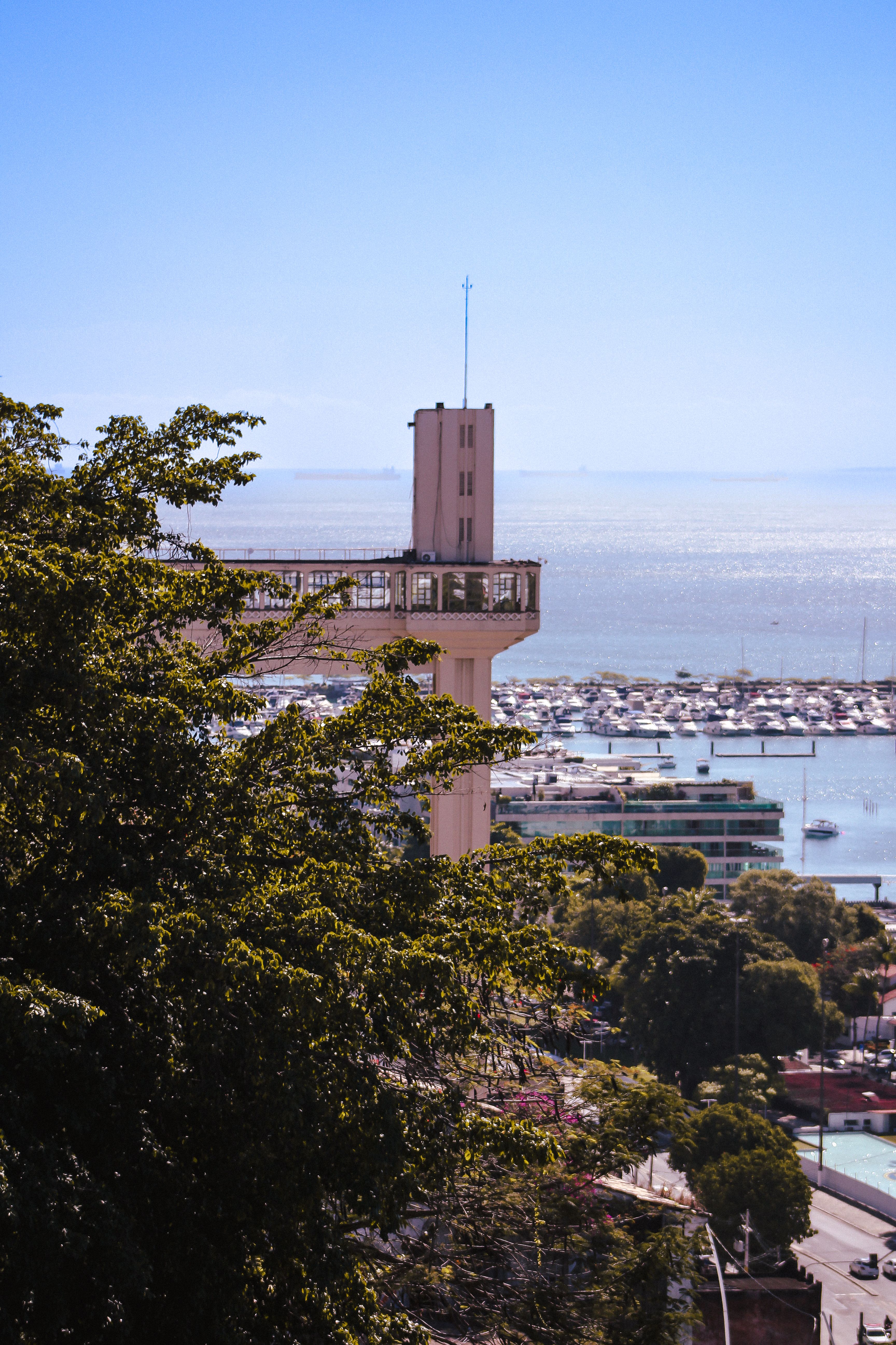 The Lacerda Elevator stands tall above the seashore, offering a breathtaking view of the bay in Salvador, Brazil.