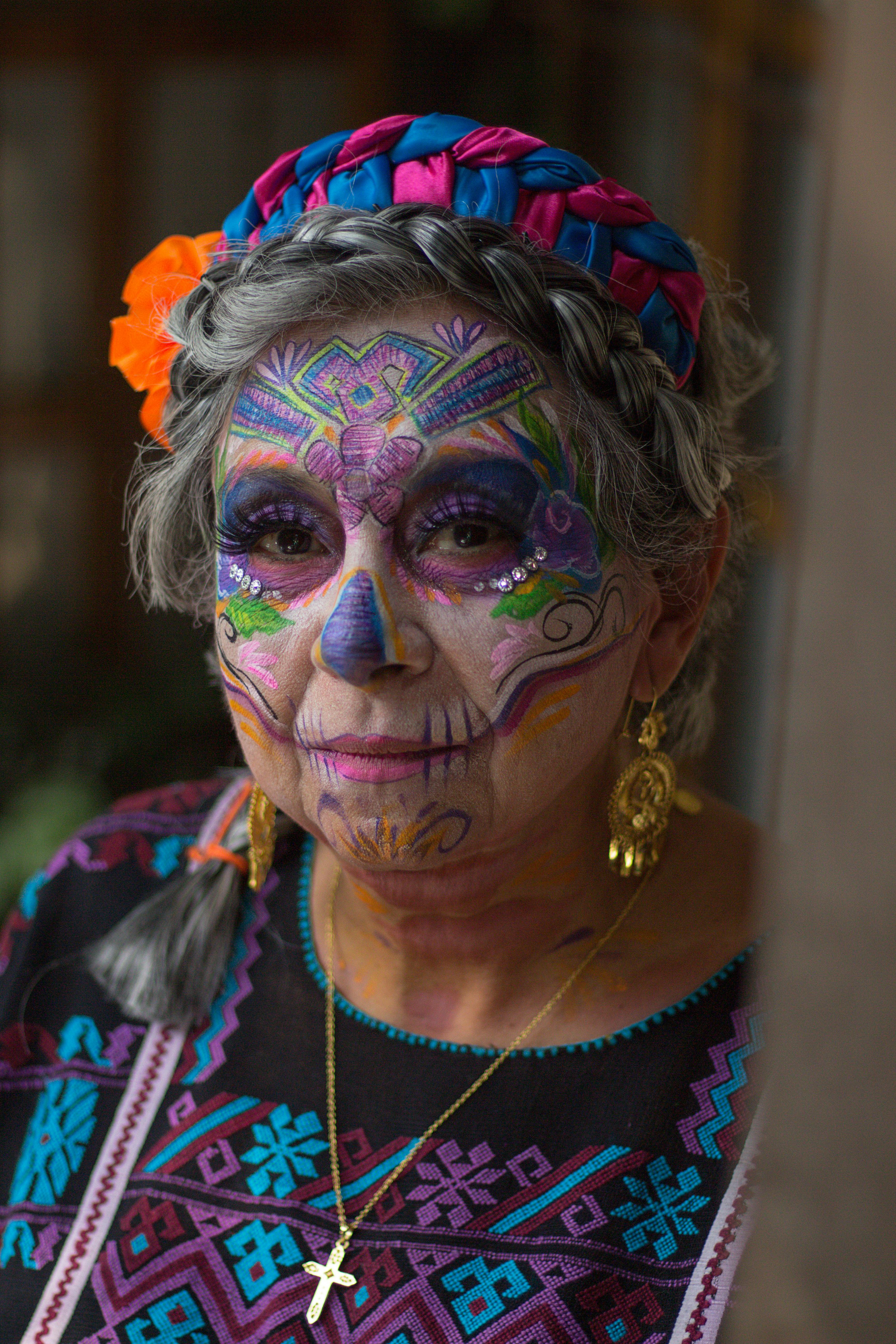 portrait of woman wearing mexican costume