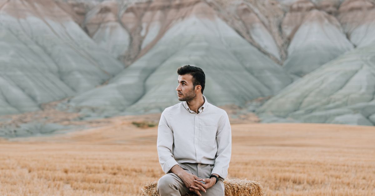 Man in Shirt on Rural Field · Free Stock Photo