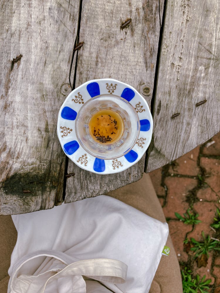 A Dish On A Wooden Table Outside
