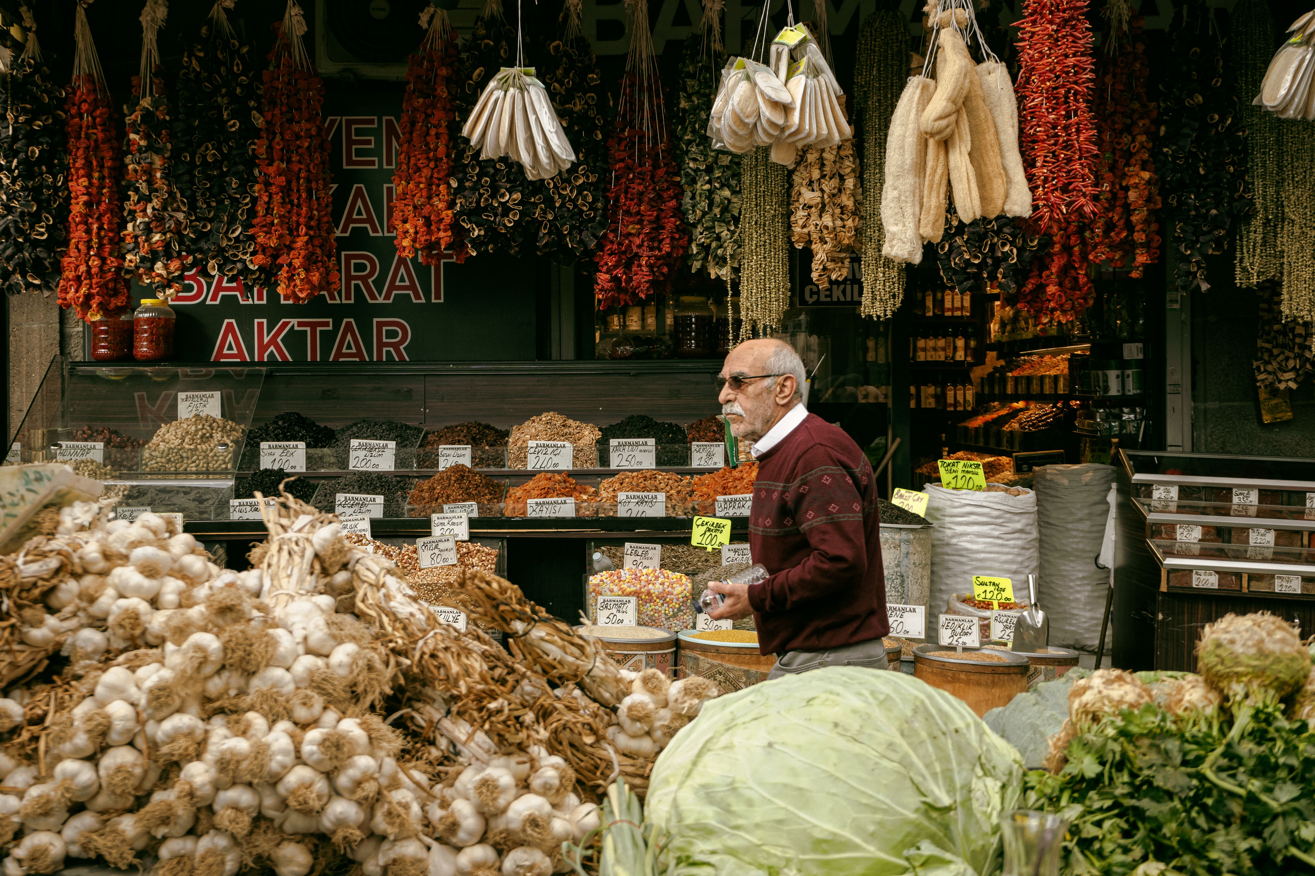 Elderly Man Selling Vegetables on a Street Market · Free Stock Photo