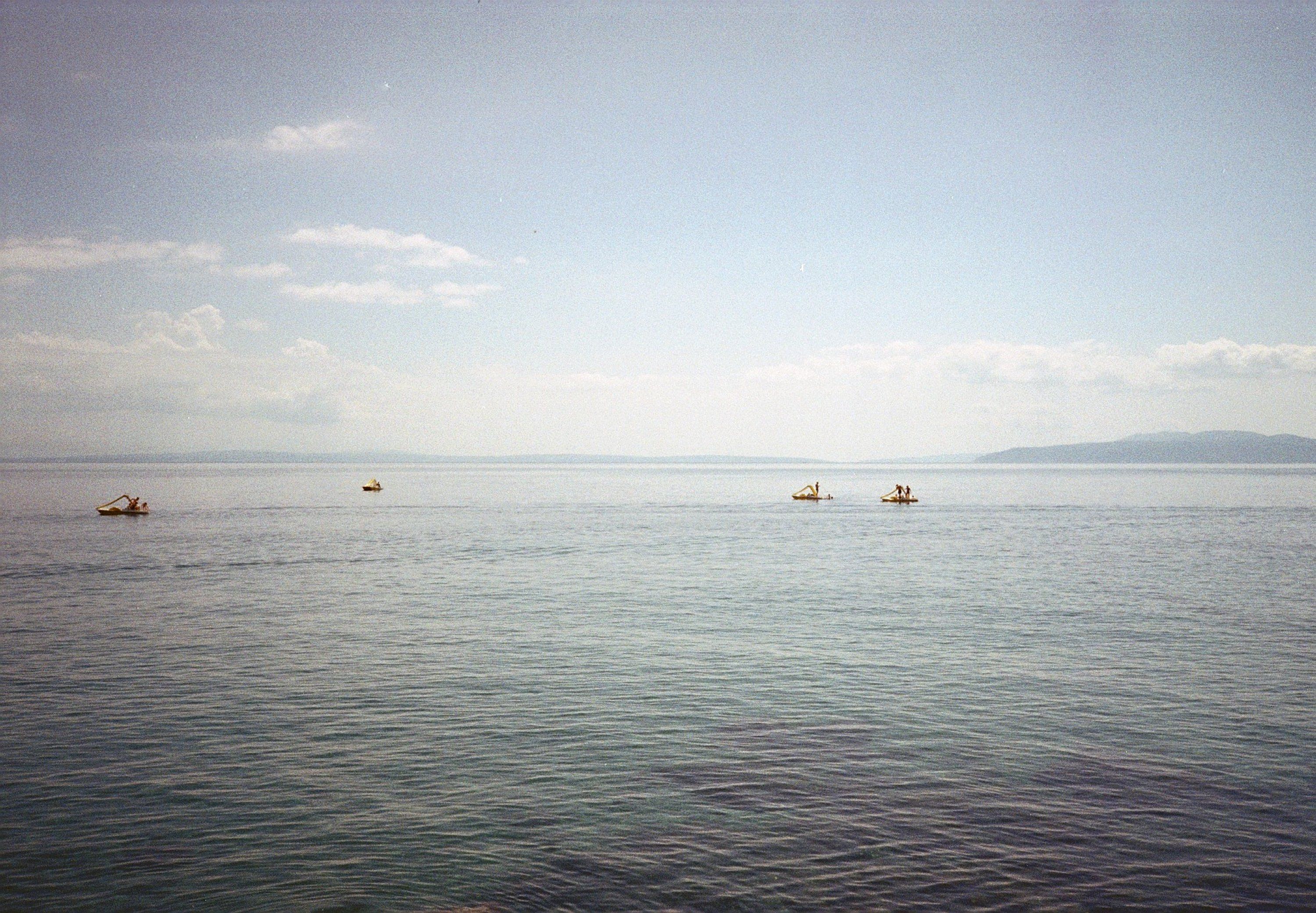 Film Photo of Boats on a Body of Water · Free Stock Photo