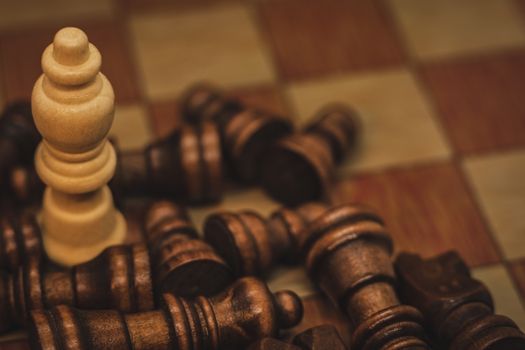 Focused chess pieces on a board, highlighting strategy and competition.