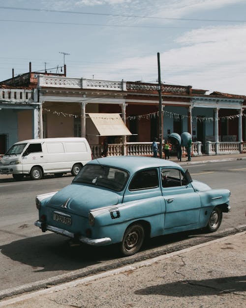 Vintage Blue Car on a Street
