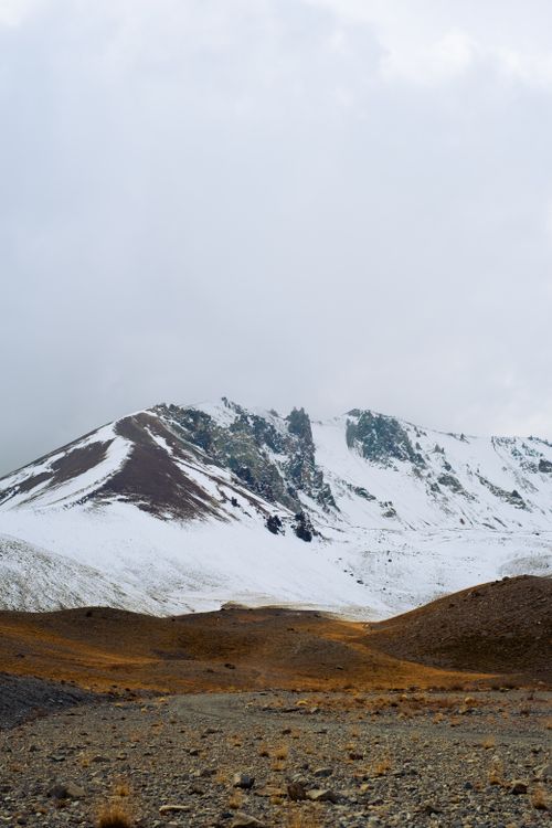 Free Scenic view of snow-covered mountains in Kayseri, illustrating winter's majesty. Stock Photo