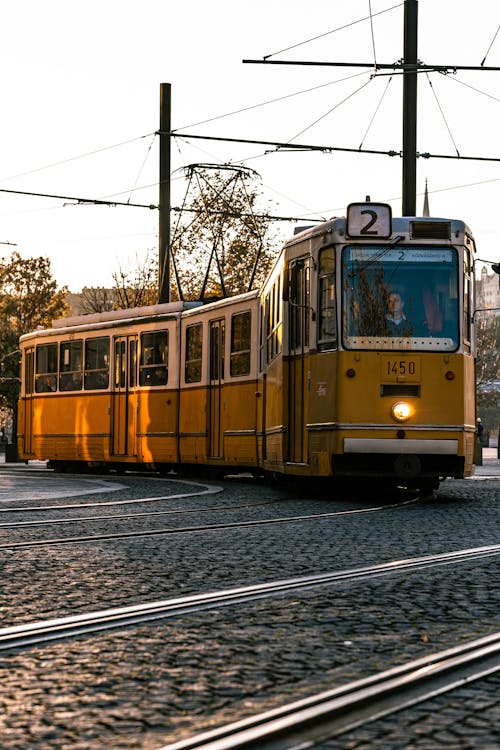 A Yellow Tram on the Tramway in City 
