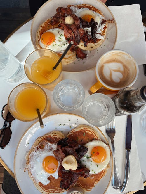 Eggs and Bacon Served on Breakfast in a Restaurant 