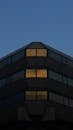 Glowing Windows in a Building at Night