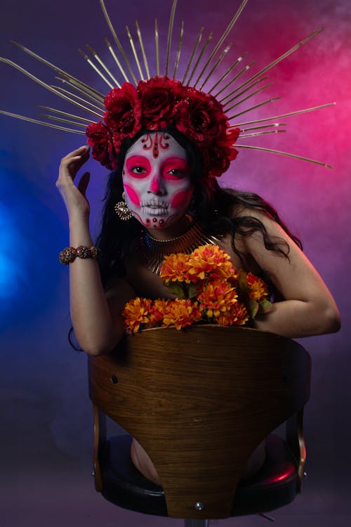 Portrait of Woman Wearing Dia De Los Muertos Makeup and Clothing