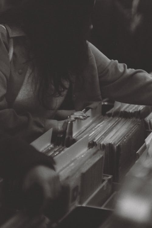 Woman in a Vinyl Shop in Black and White