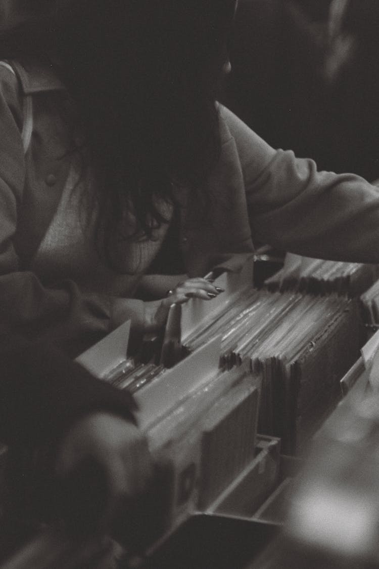 Woman In A Vinyl Shop In Black And White