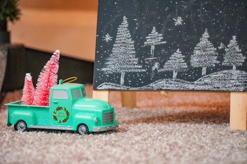 A Toy Car with Christmas Trees