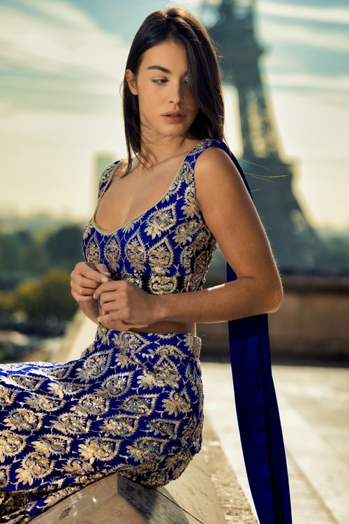 Elegant Woman in a Dress Sitting on the Background of the Eiffel Tower in Paris, France Free Stock Photo Elegant Woman in a Dress Sitting on the Background of the Eiffel Tower in Paris, France Free Stock Photo