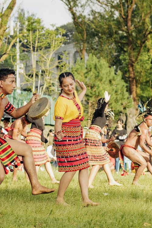 Dancer in a Folk Costume with a Dance Group Performing at a Festival