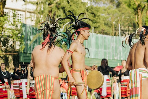 Topless Men in Tribal Clothing