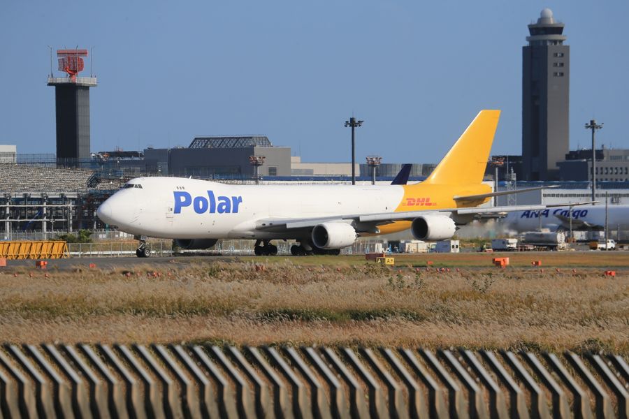 Cargo airplane parked on the tarmac at an airport