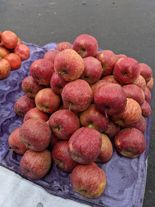 A Pile of Red Apples on a Market 