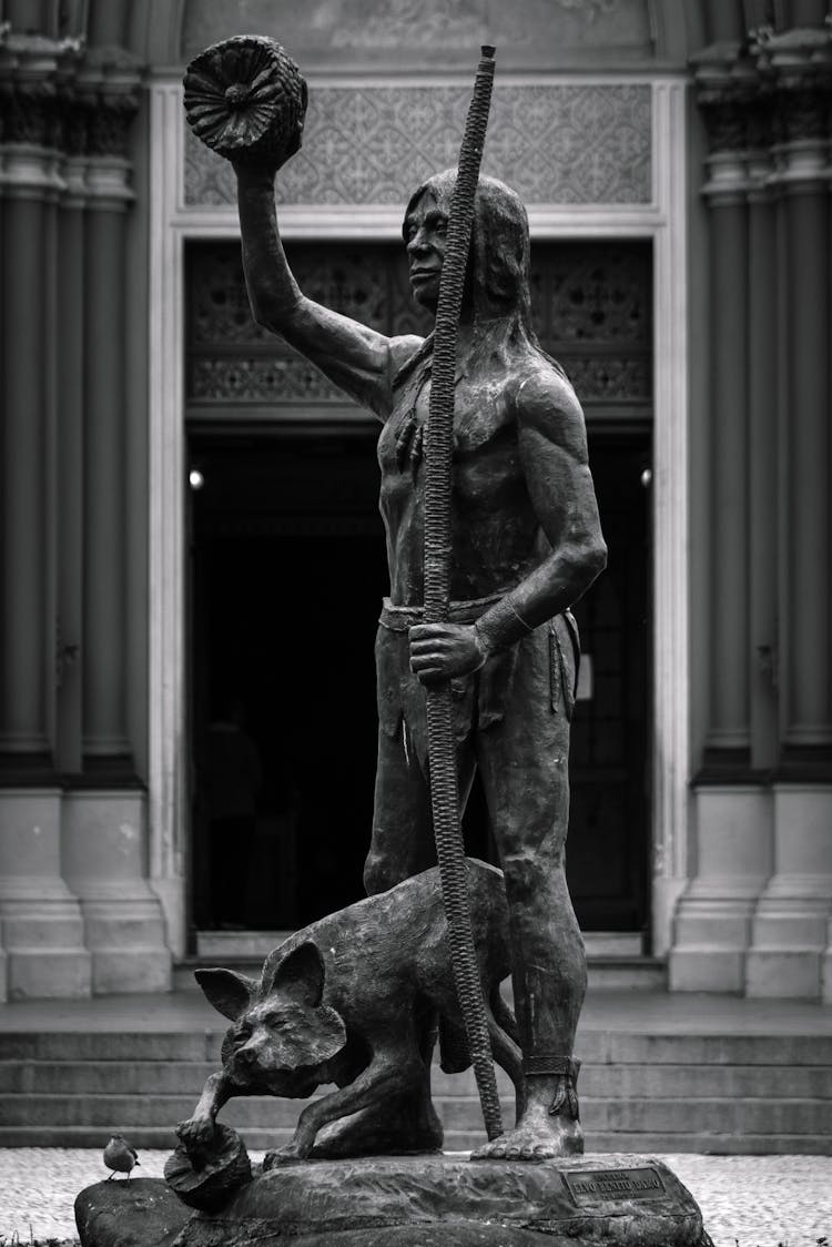 Statue Of Hunter With Arch And Dog