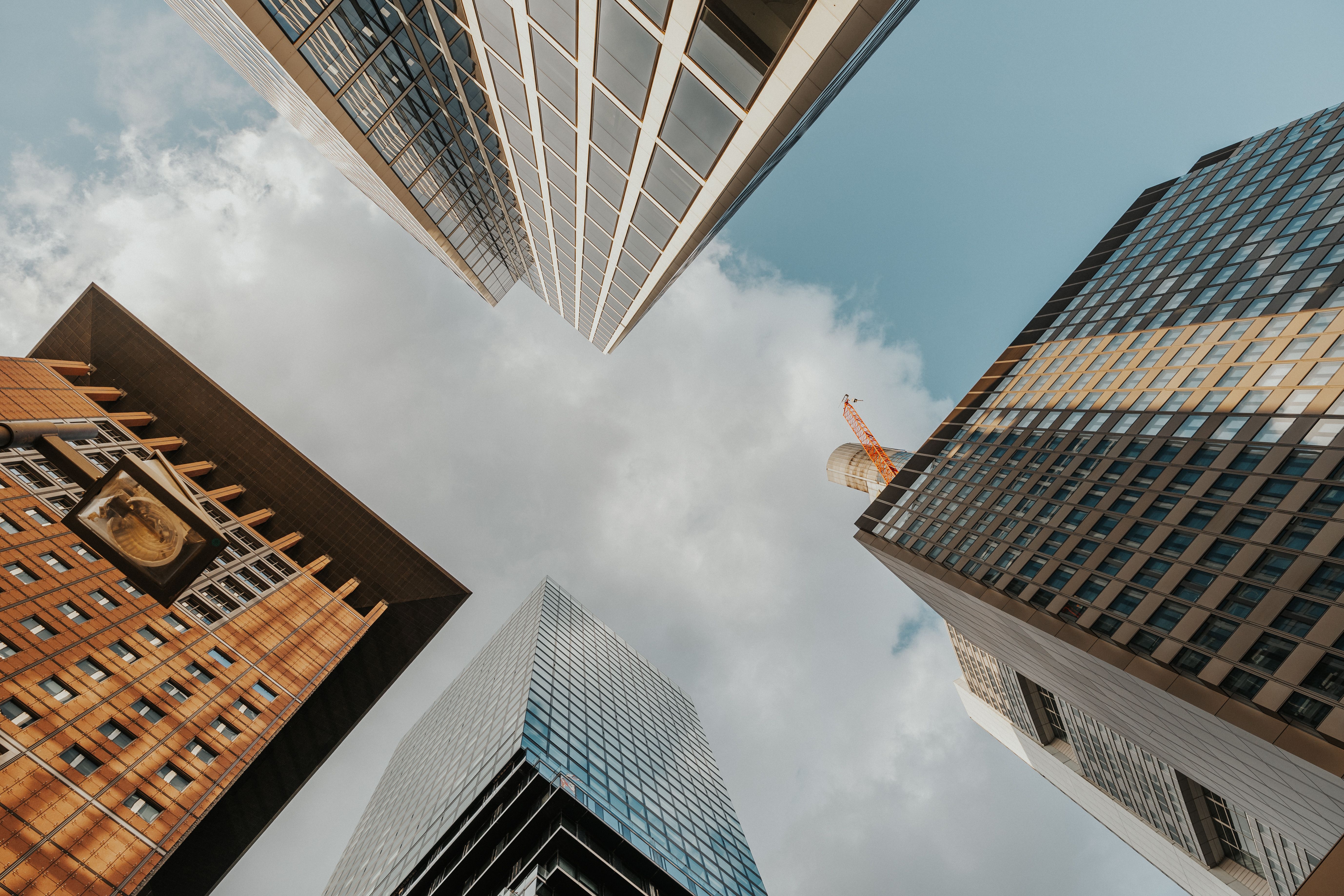 Low Angle Shot of Modern Skyscrapers in City · Free Stock Photo