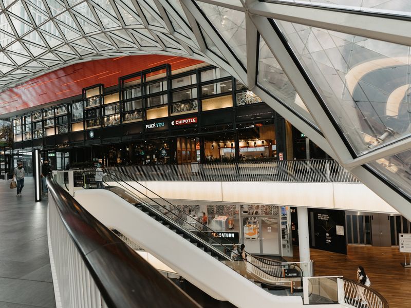 Modern shopping mall interior with retail units