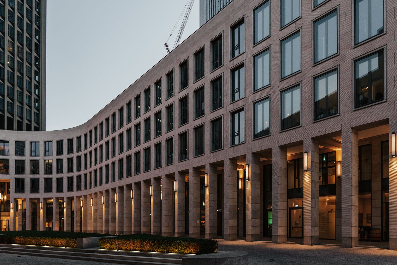 Modern multi-storey office building at dusk