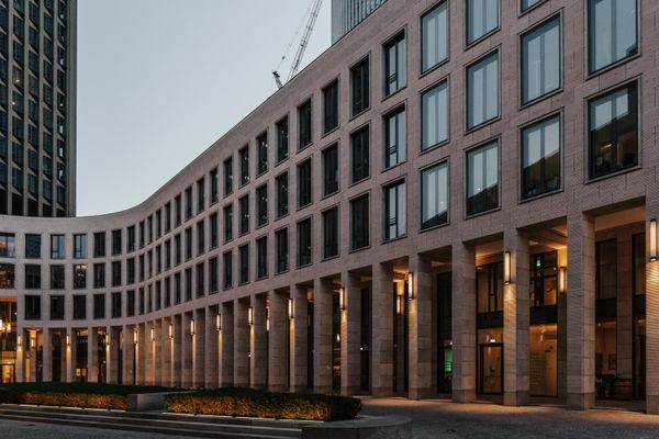 Modern multi-storey office building at dusk