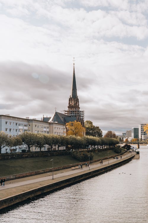 Church Tower Surrounded by Scaffolding on the Riverbank of the Main in Frankfurt