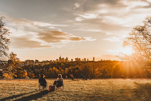 Free Breathtaking view of Frankfurt skyline at sunset from Lohr Park, Germany. Stock Photo