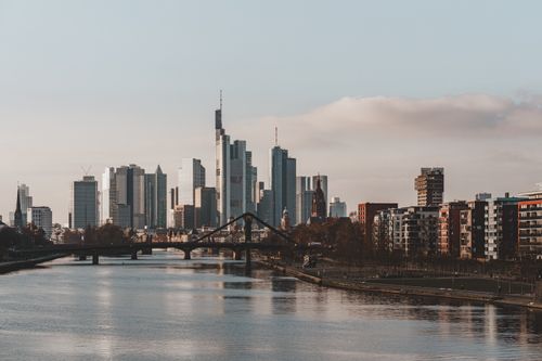 Free Stunning view of Frankfurt's skyline reflecting on the River Main during daylight. Stock Photo