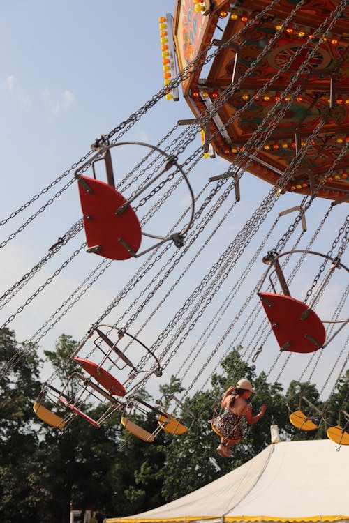 Kids Riding on a Merry-Go-Round Carousel 