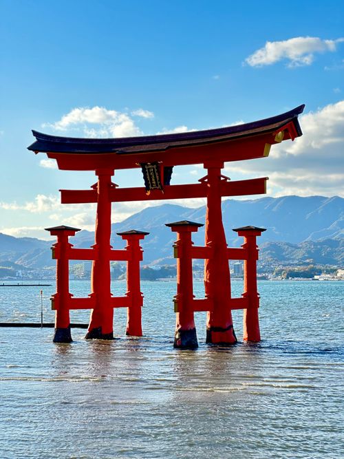 Free Breathtaking scene of the famous Torii gate at Itsukushima Shrine, Japan. Stock Photo