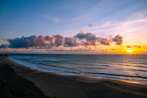 地平線, 岸邊, 日落 的 免費圖庫相片